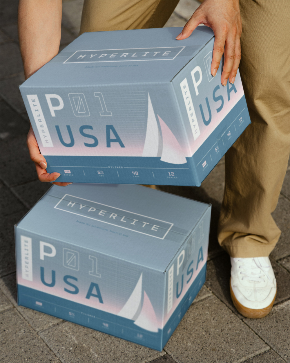 Hyperlite box packaging being lifted by a male