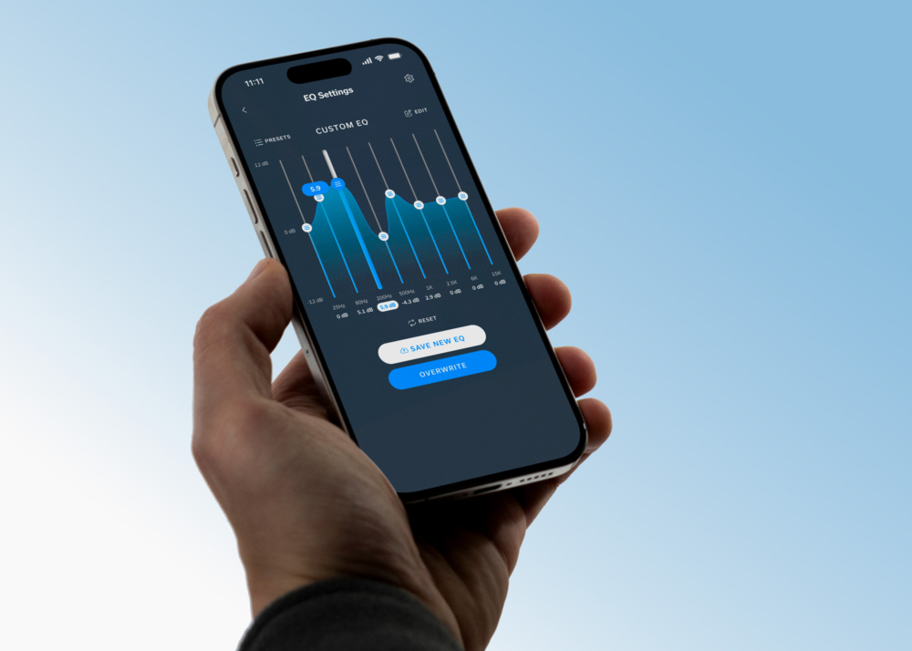 Hand holding iPhone with the custom eq screen from the Status Hub displayed