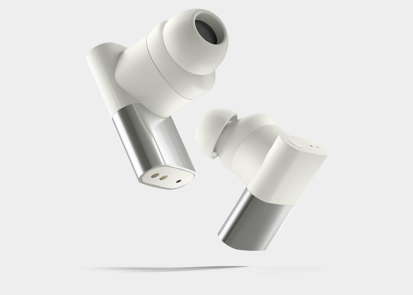 Status Between 3ANC earbuds in bone on stark light gray background