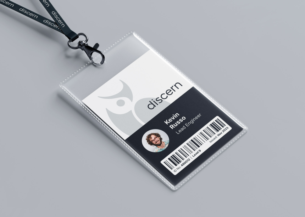 Branded employee ID mockup from the Discern Visual Identity
