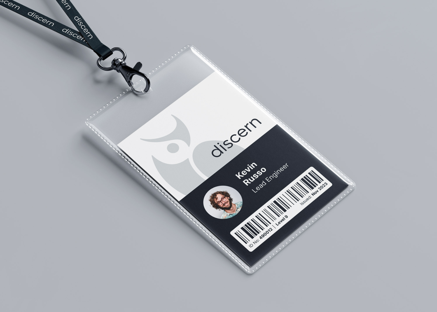 Branded employee ID mockup from the Discern Visual Identity