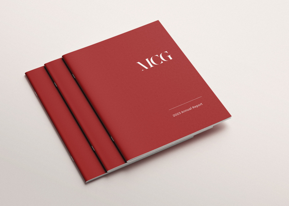 Red books branded with Measure logos