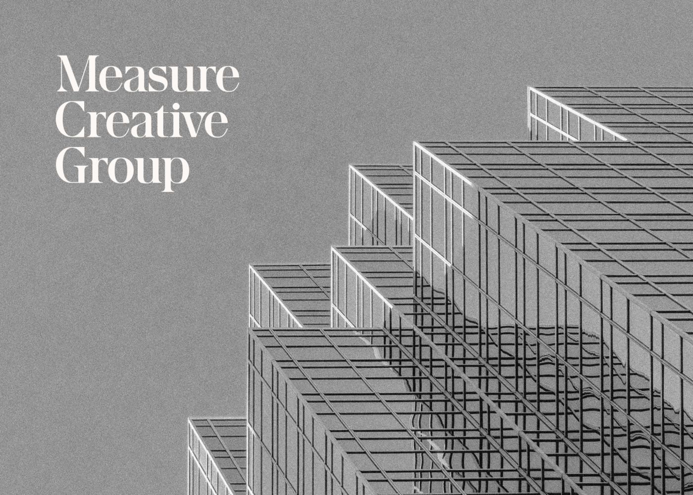Measure creative wordmark logo overlaid on an architectural photograph