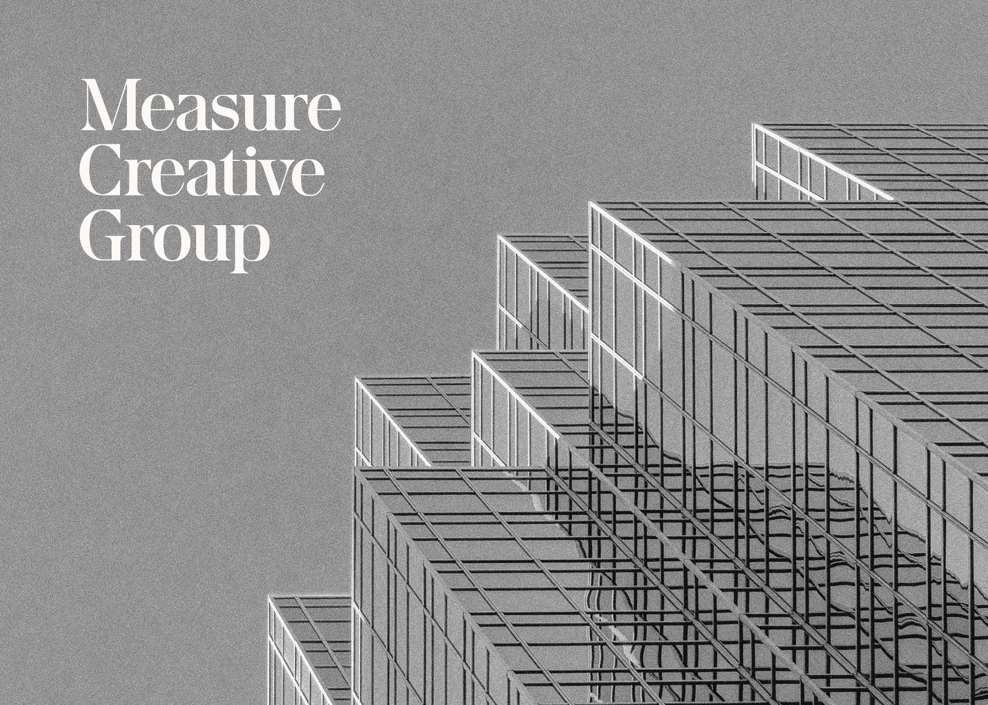 Measure creative wordmark logo overlaid on an architectural photograph