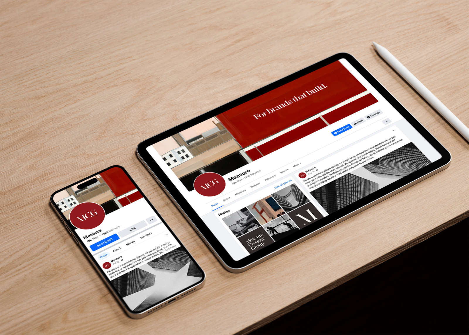 An iPhone and iPad tablet showing Measure Creative Group branded social media pages.