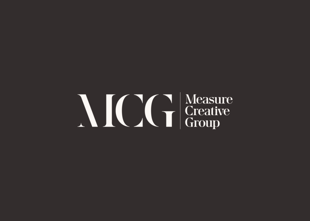 Measure Creative Group combination logo lockup in white on charcoal