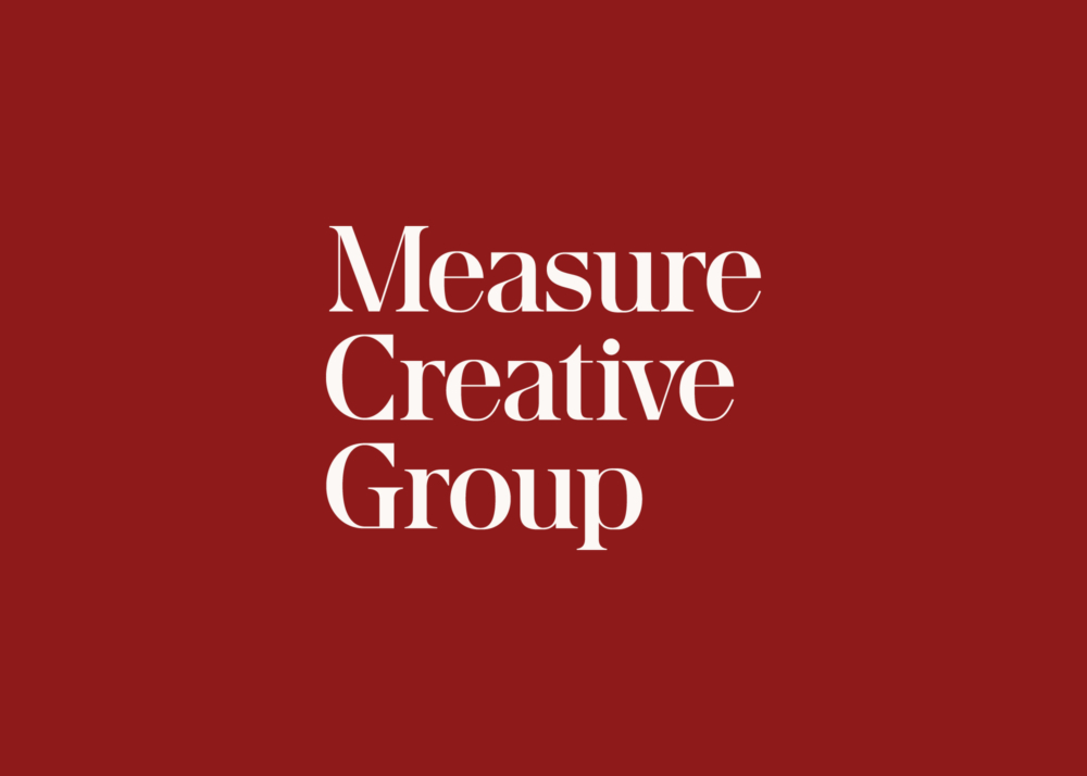 Measure Creative Group stacked wordmark logo in white on red