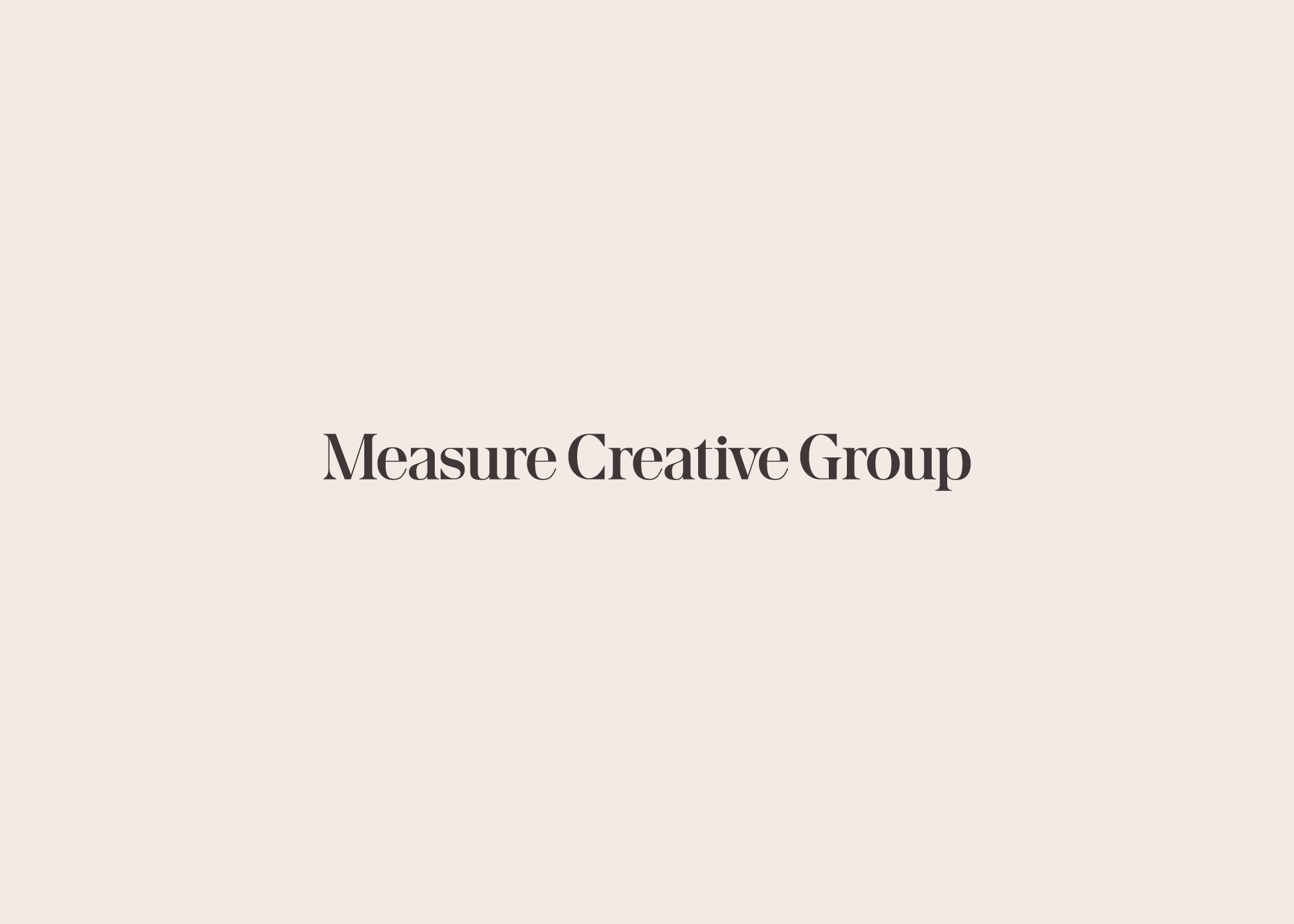Measure Creative Group expanded wordmark logo in charcoal on cream
